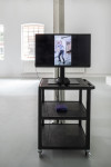 <p>D’Ette Nogle, <em>Stand Up</em>, 2019, Single channel Video, Monitor, A/V-Wagen / Single channel video, monitor, A/V cart, Halle für Kunst Lüneburg, 2021, Courtesy the artist and Hannah Hoffmann Gallery, Photo: Fred Dott.</p>